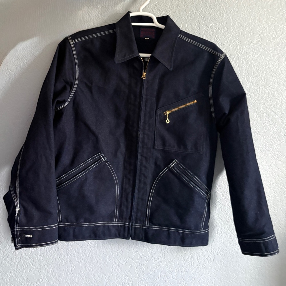 Black Jean Jacket with Sturdy Construction and Traditional Cut